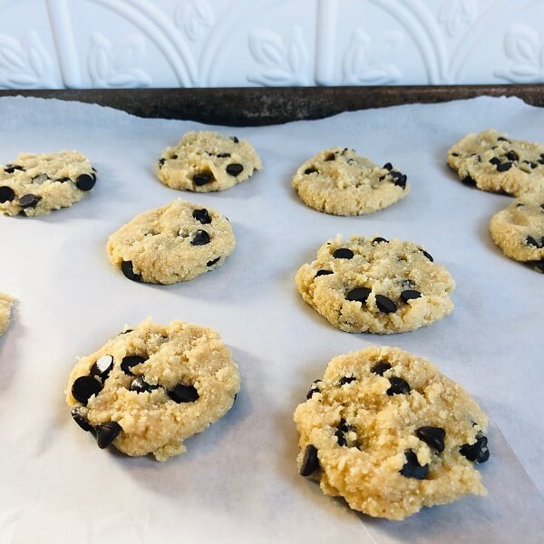 Flattened paleo raw cookie dough on a baking tray.