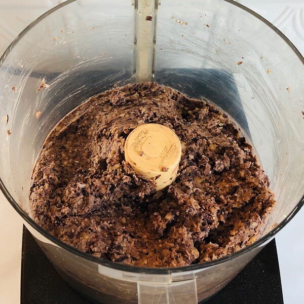 Raw meatball dough in a food processor.