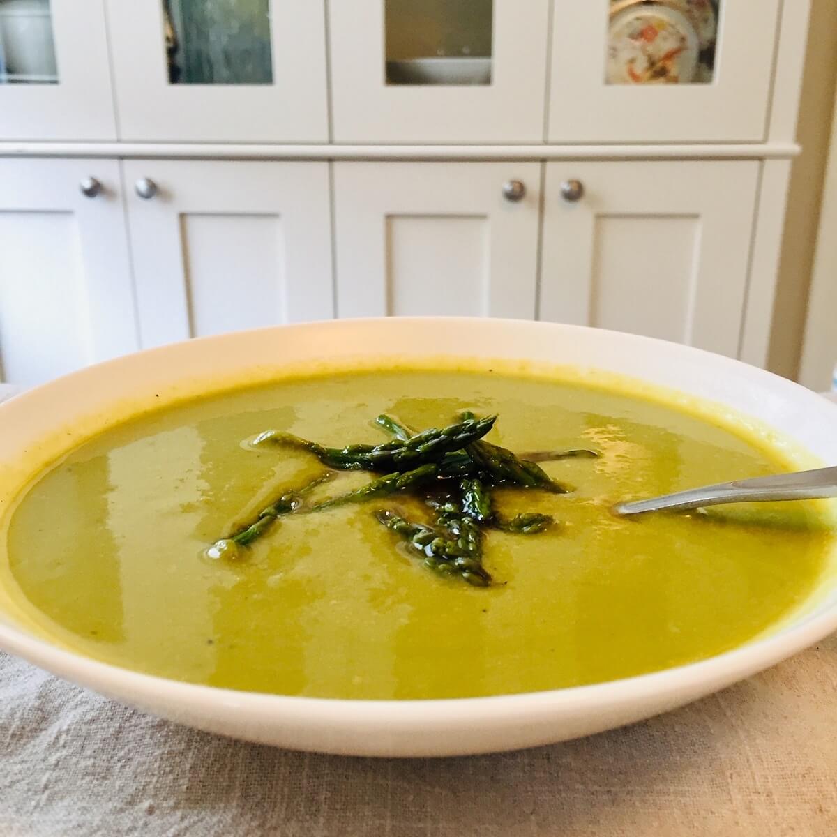 A bowl of dairy-free asparagus soup.