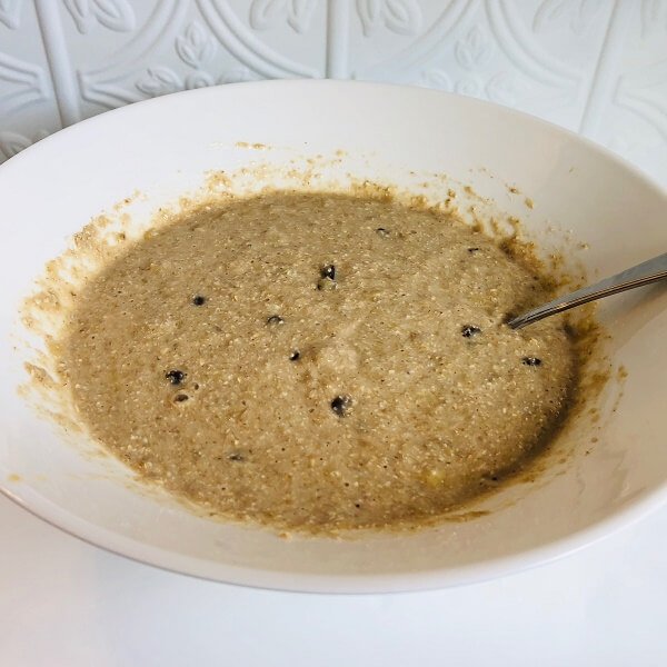 Muffin batter in a white mixing bowl.