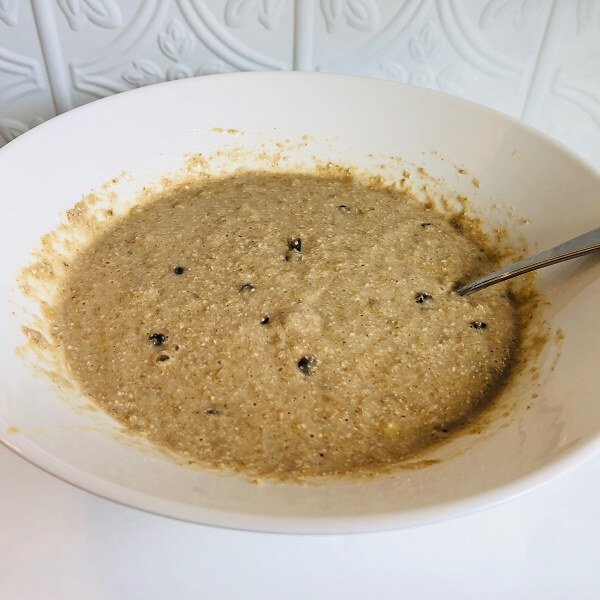 Muffin batter in a white mixing bowl.