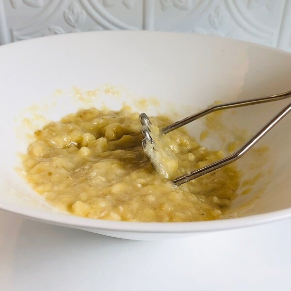 Mashed bananas in a bowl.