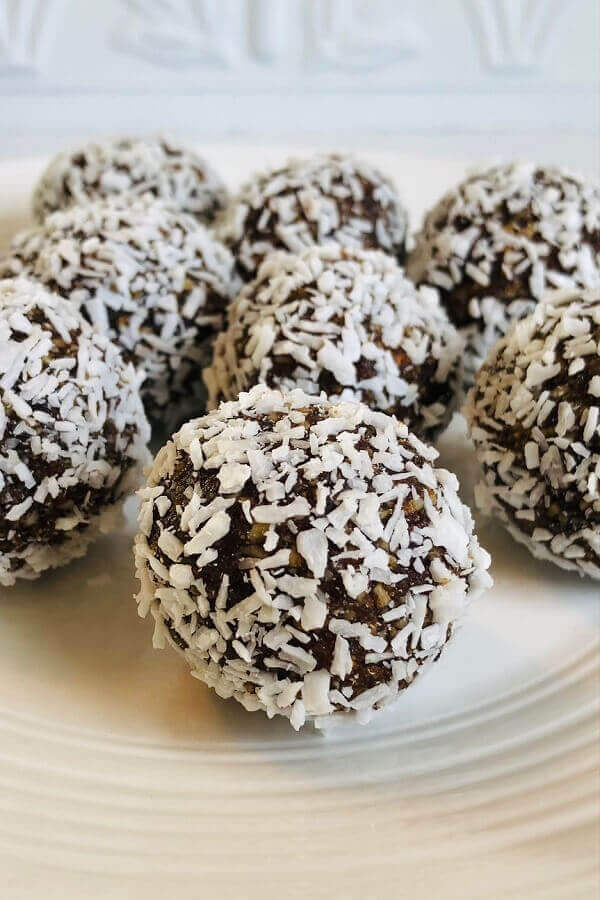 Coconut balls on a plate.