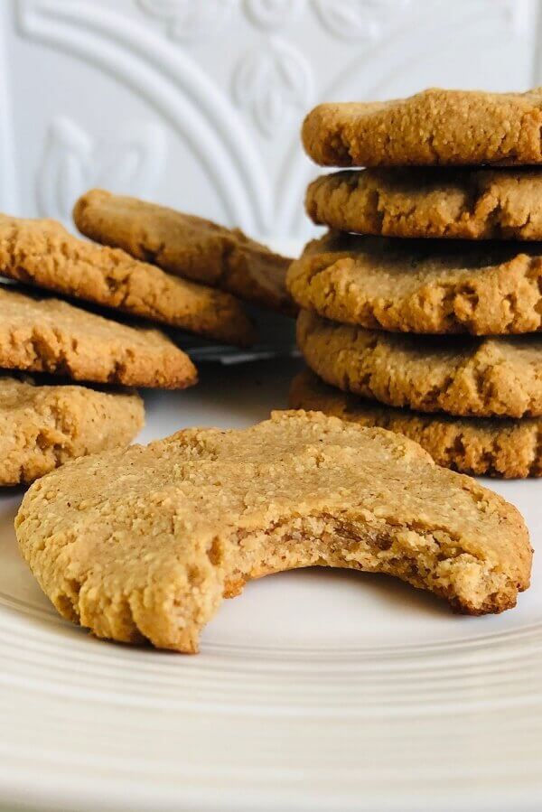 Peanut butter cookies arranged on a plate.
