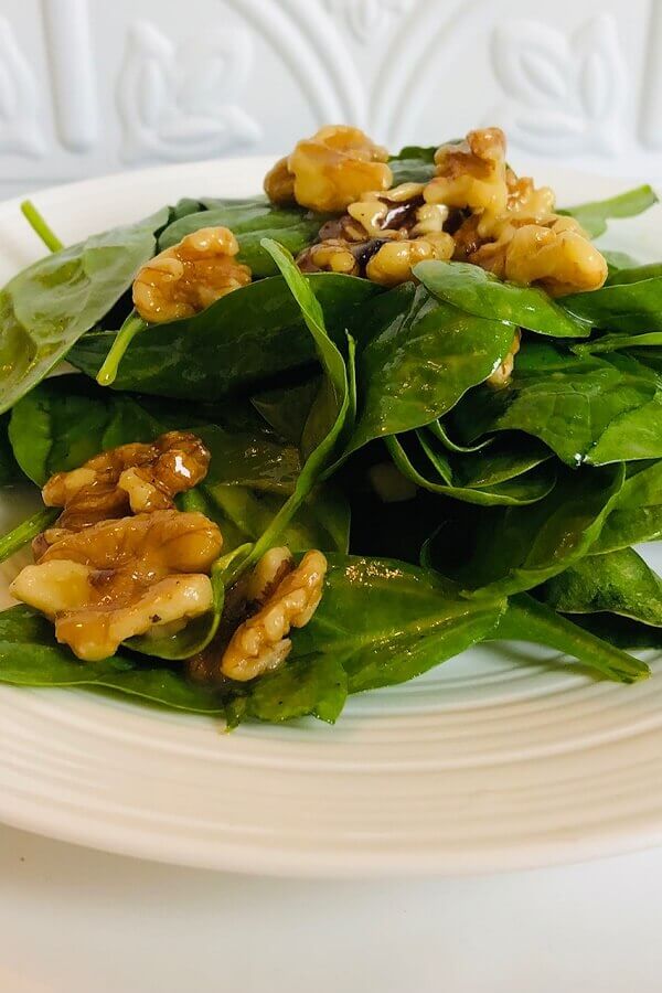 Salad on a white plate.