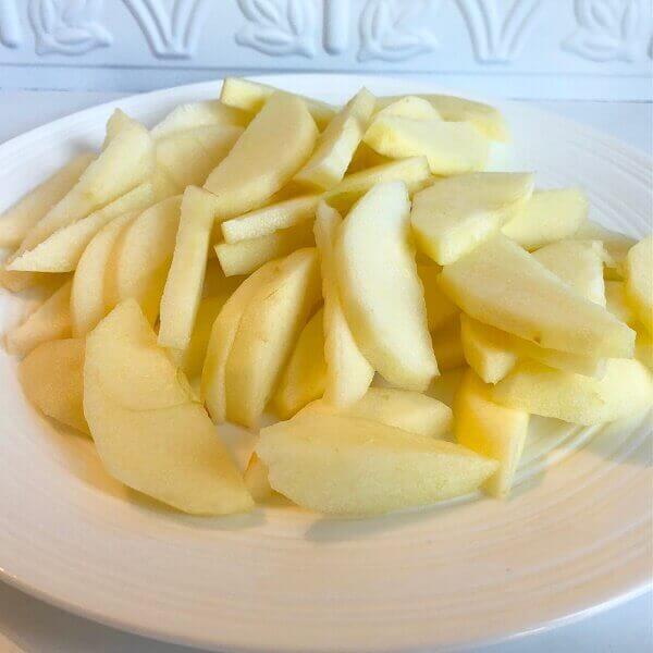 Sliced apples on a plate.