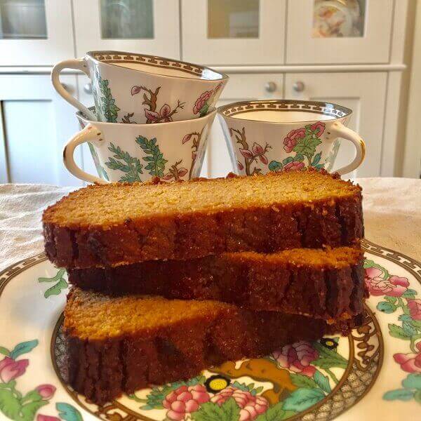 Sweet potato bread stacked on a plate.