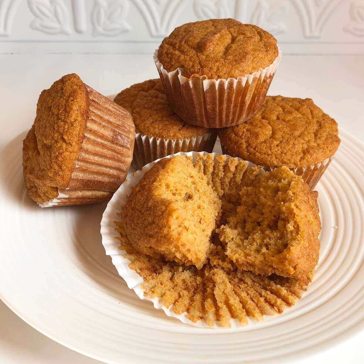 Muffins displayed on a plate.