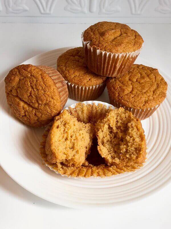 Corn muffins arranged on a plate.