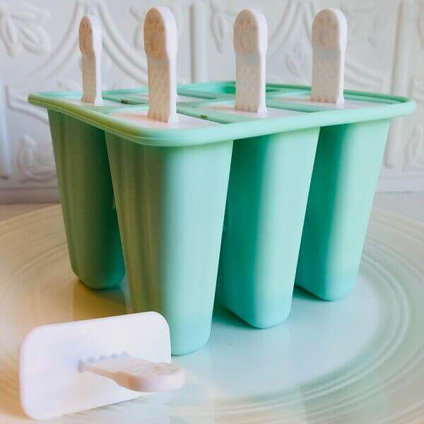 A turquoise popsicle mold.