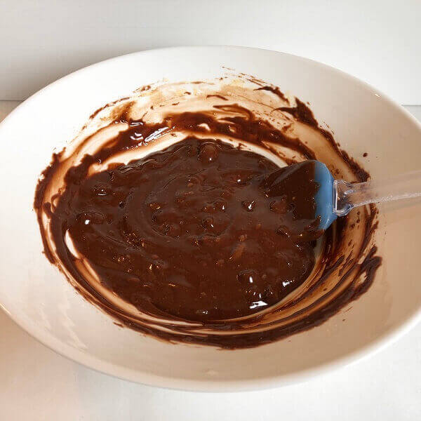 Raw brownie batter in a mixing bowl.