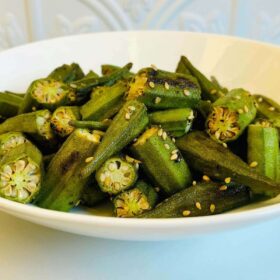 Sesame garlic okra piled in a bowl.