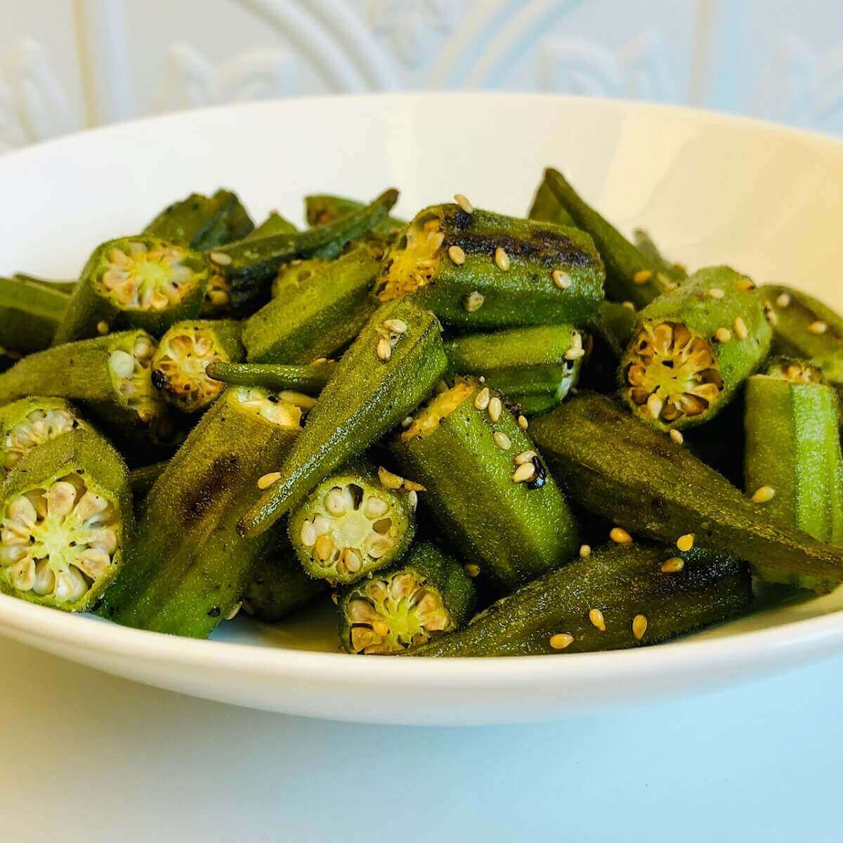 Oven roasted okra piled in a bowl.