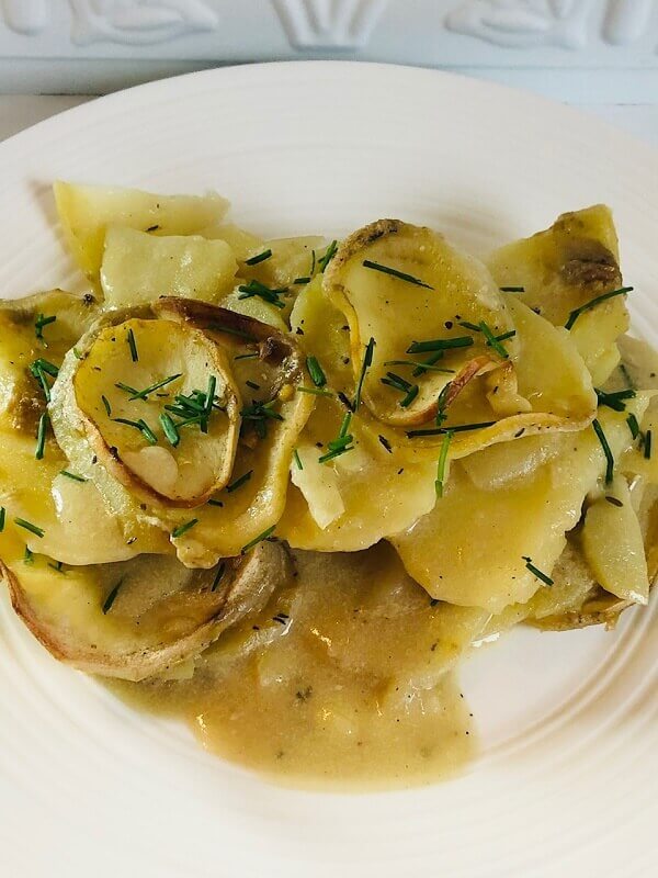 Vegan scalloped potatoes on a plate.