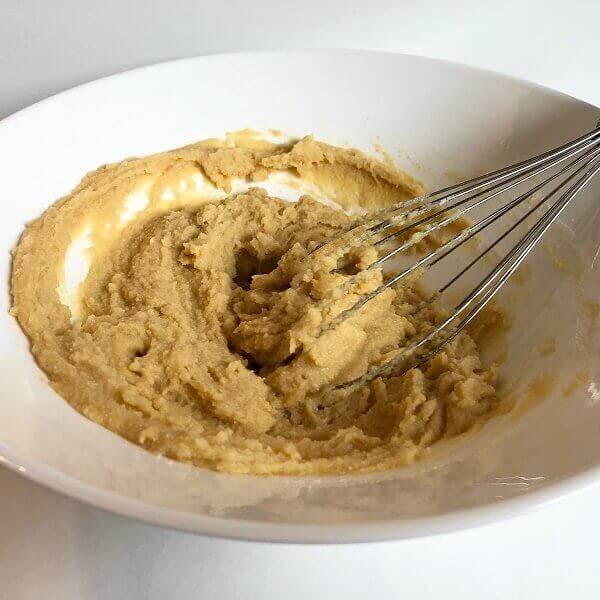 Cake batter in a large mixing bowl.