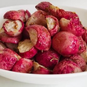 Cooked radishes piled in a bowl.