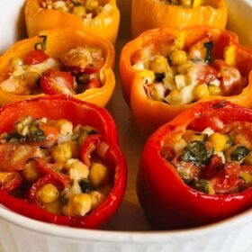 A baking dish filled with stuffed peppers.