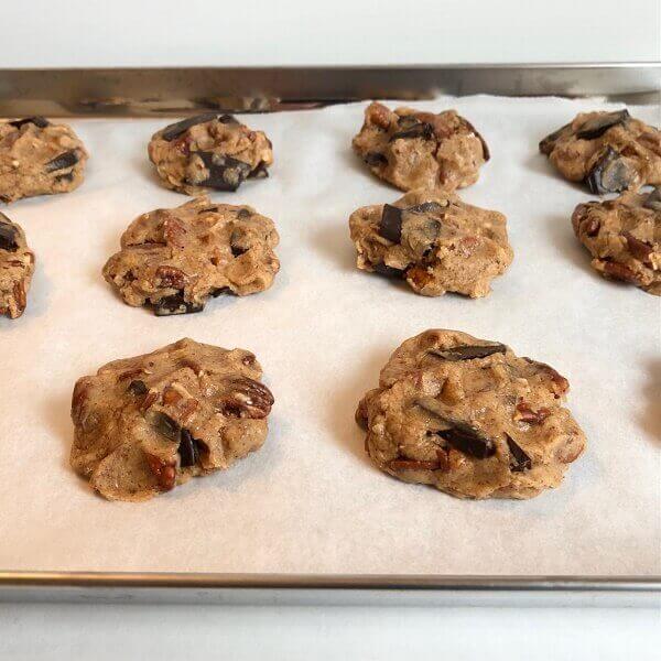 Raw cookie dough on a sheet pan.