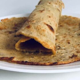 Two wraps on a white plate.
