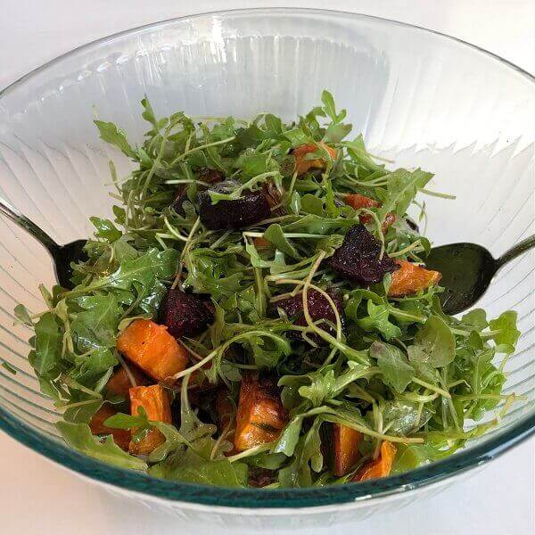 Salad in a large glass bowl.