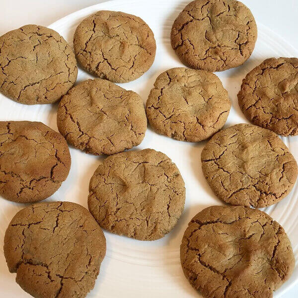 A batch of cookies on a white plate.
