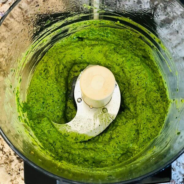 Pesto blended in a food processor.