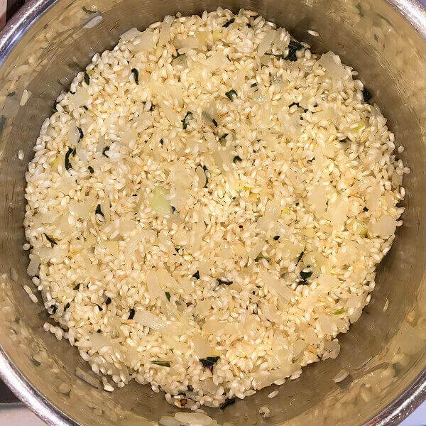 Rice toasting in a pot.