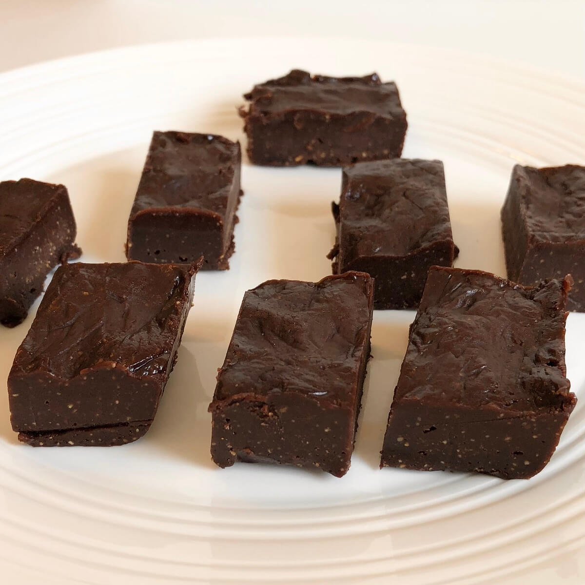 Fudge squares on a white plate.