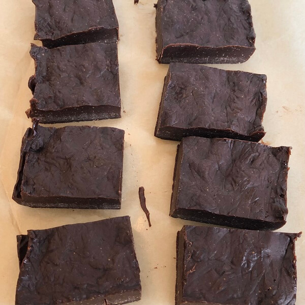 Slices of fudge on parchment paper.