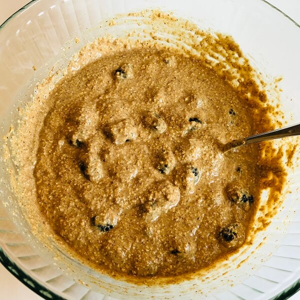 Raw muffin batter in a large mixing bowl.