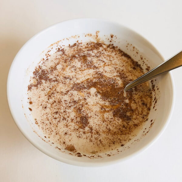 Ingredients being mixed in a bowl.