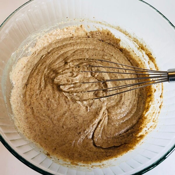 Flaxseed batter in a large glass mixing bowl.