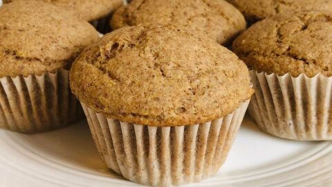 Flaxseed muffins on a white plate.