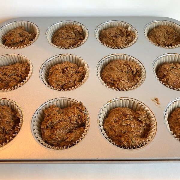 Raw veggie muffins in a pan.