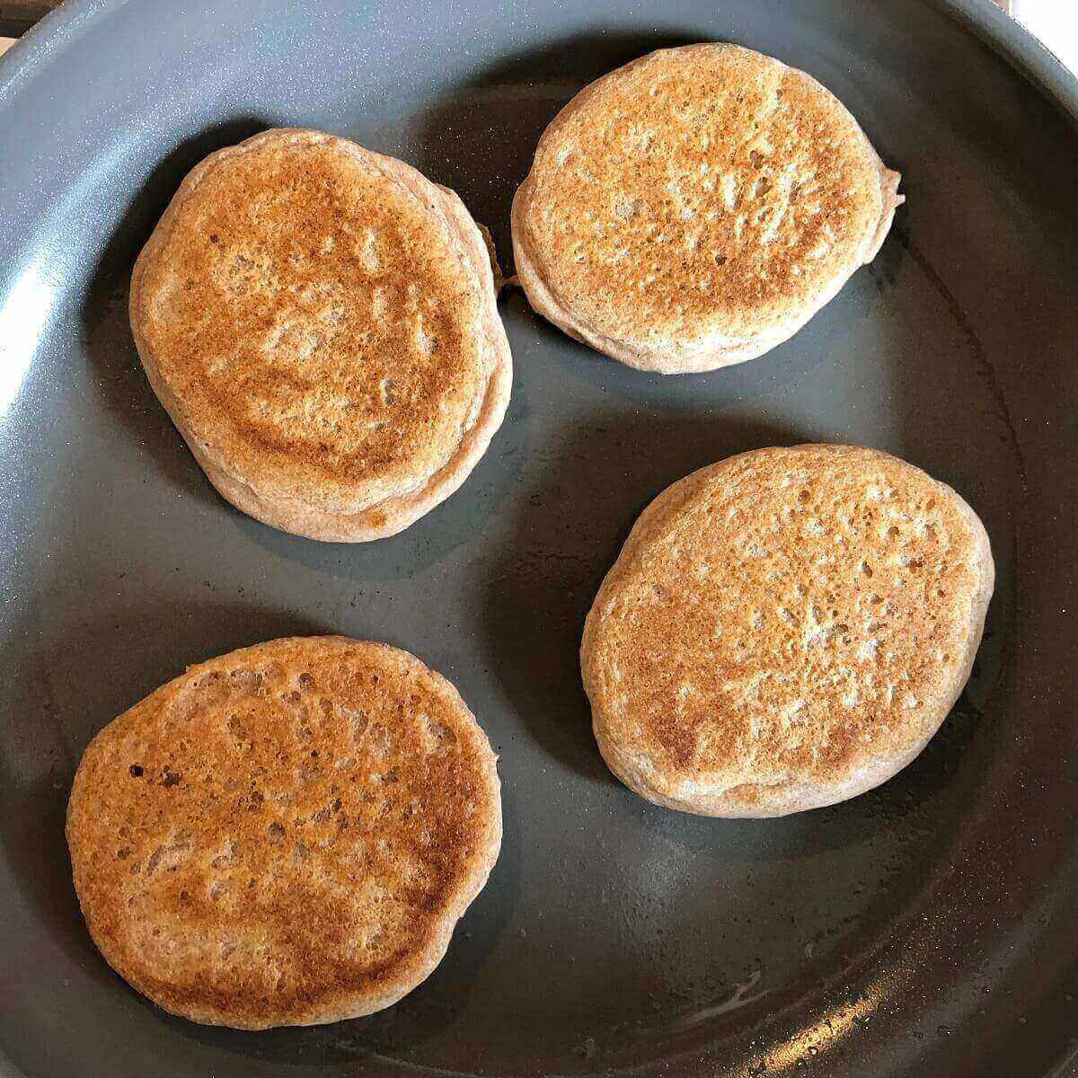 Pancakes in a frying pan.