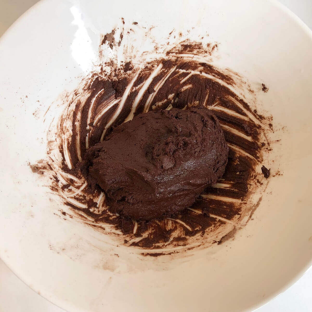 Spelt cookie dough in a large mixing bowl.