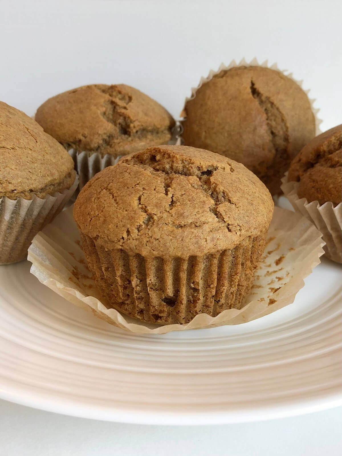Spelt muffins on a white plate.