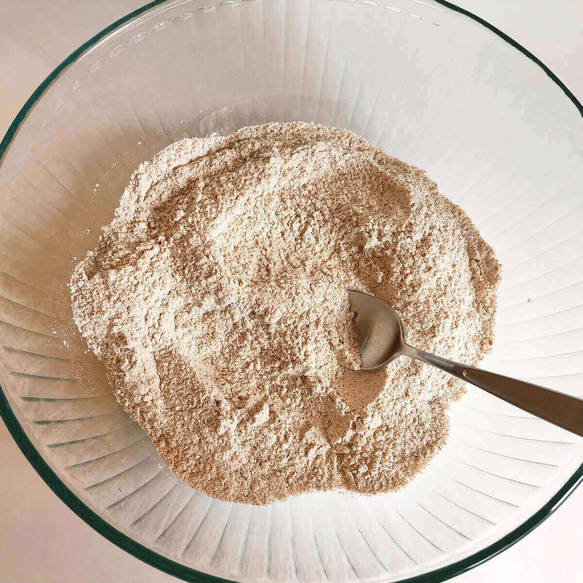 Bread ingredients in a glass bowl.