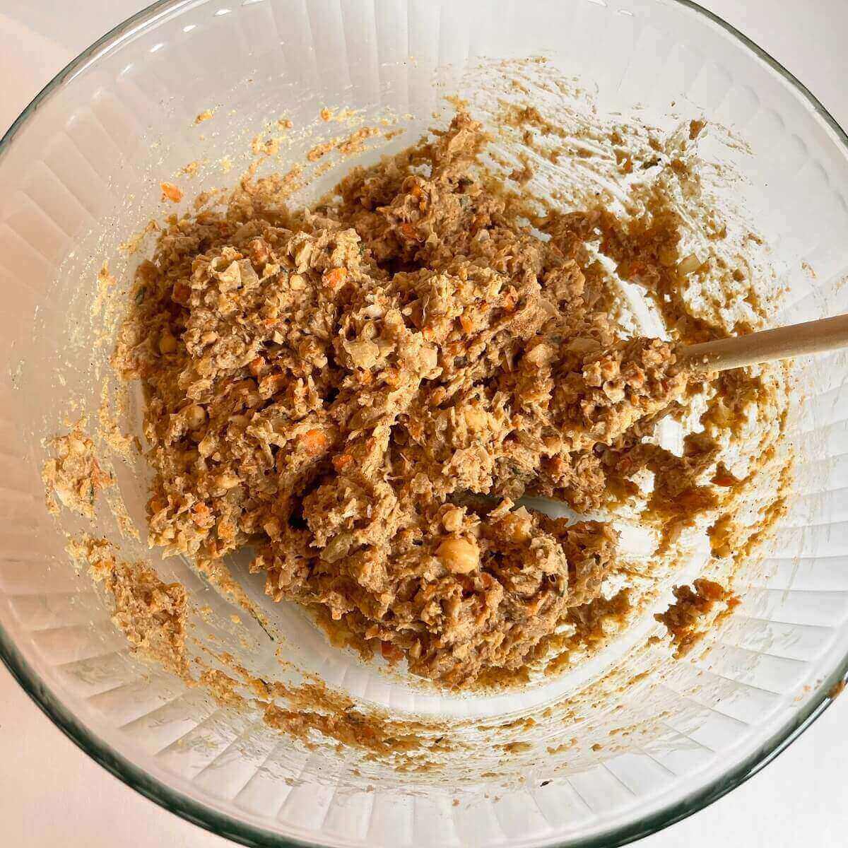 Raw meatloaf batter in a large mixing bowl.