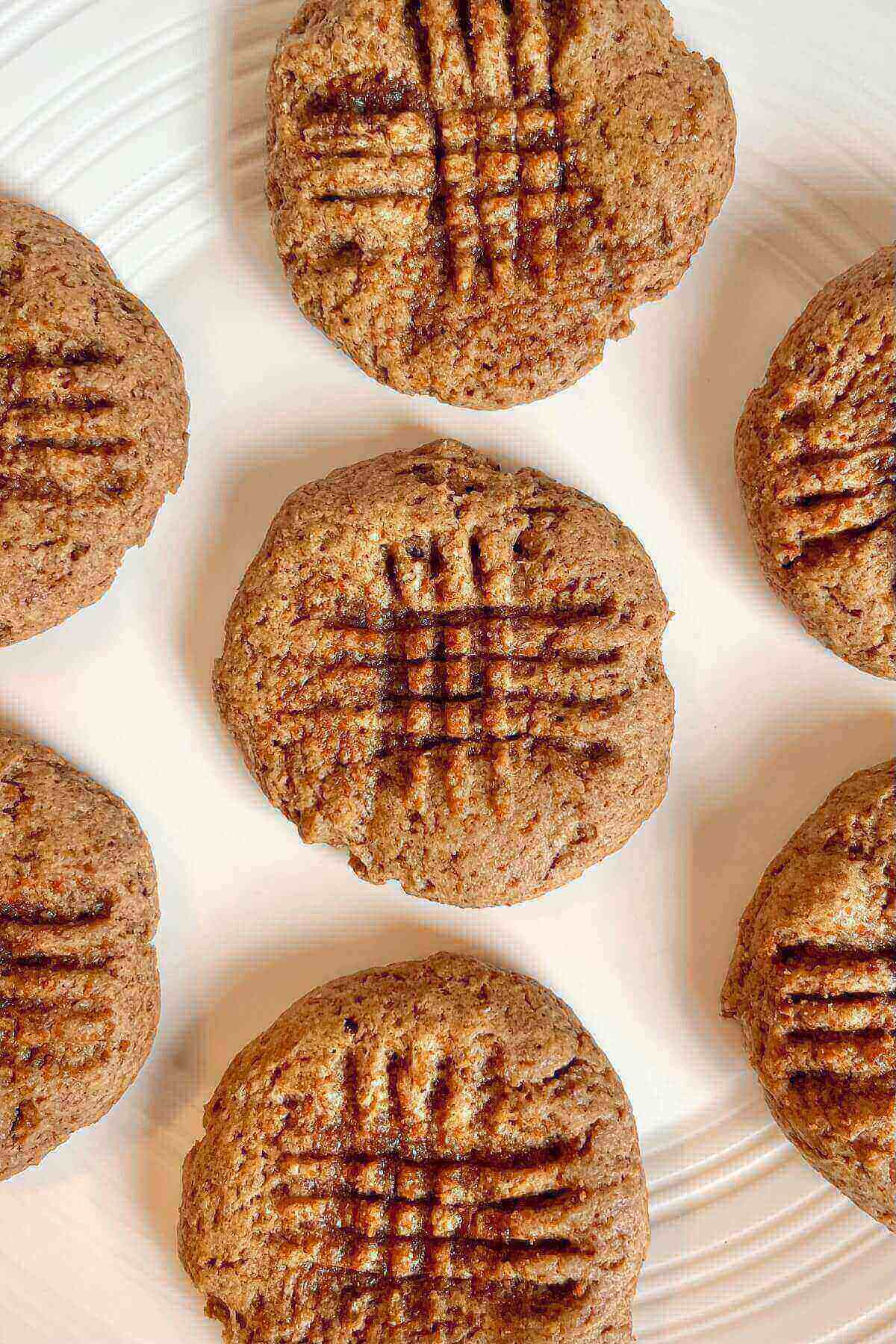 Light brown cookies on a plate.