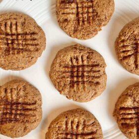 Light brown cookies on a white plate.
