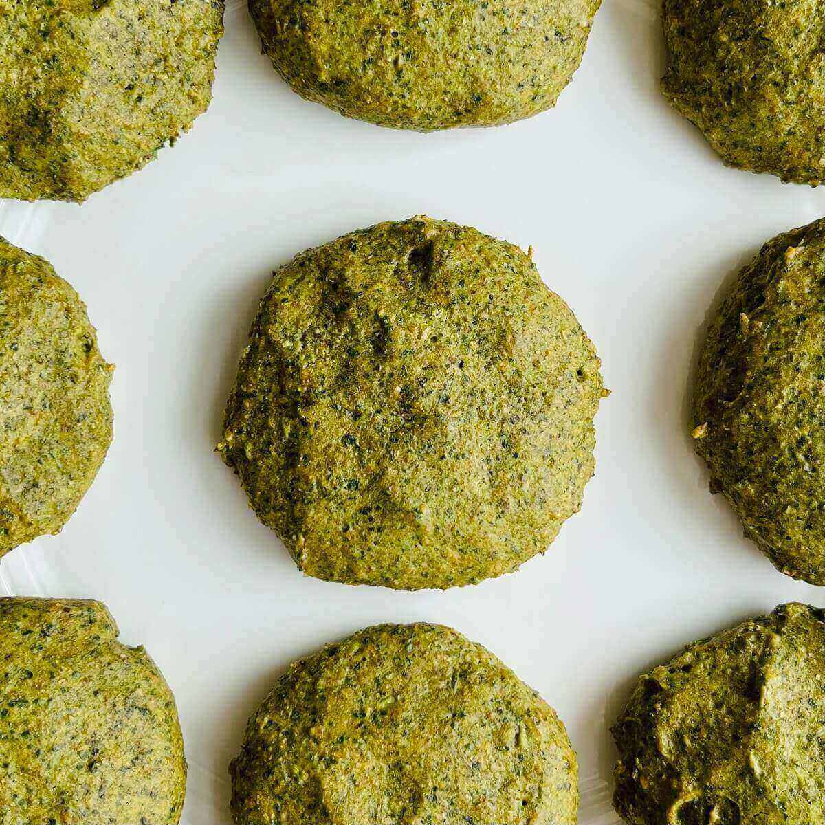 Kale cookies on a white plate.