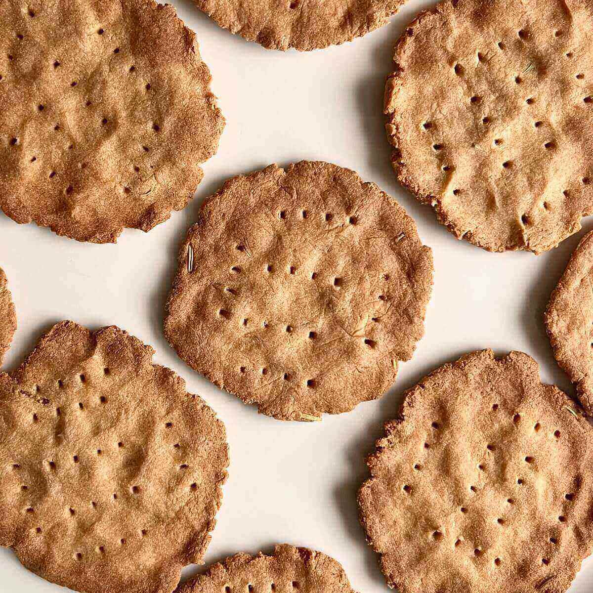 Crackers on a white plate.