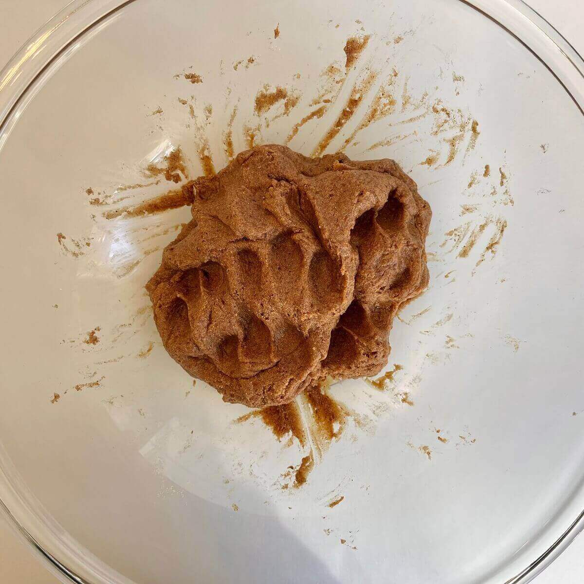 Amaranth dough in a large glass mixing bowl.