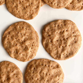 Spelt crackers on a white plate.