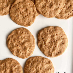 Crackers piled on a plate.