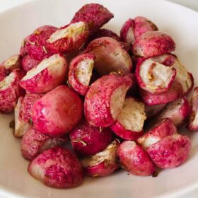 Cooked radishes in a bowl.