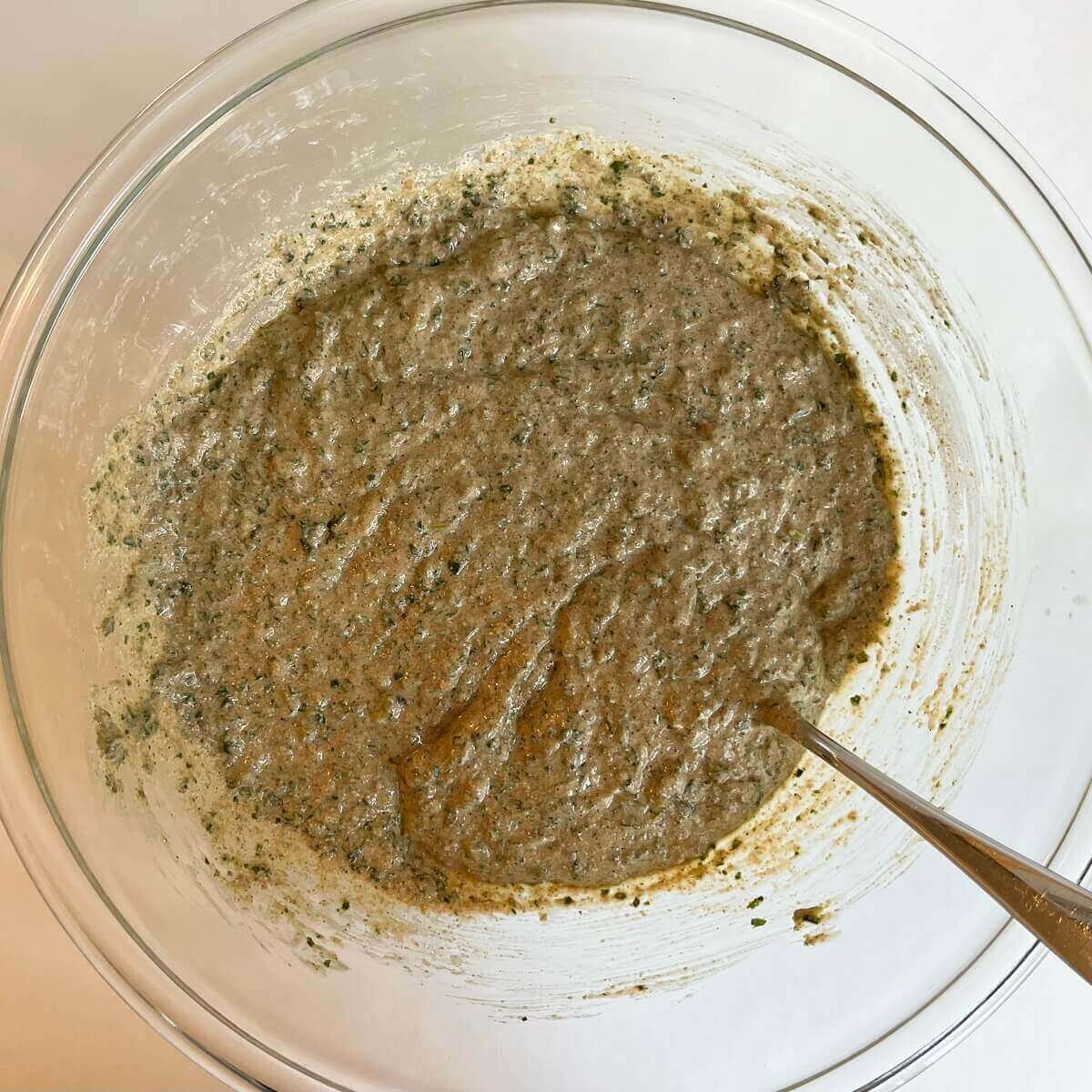 Kale batter in a glass bowl.