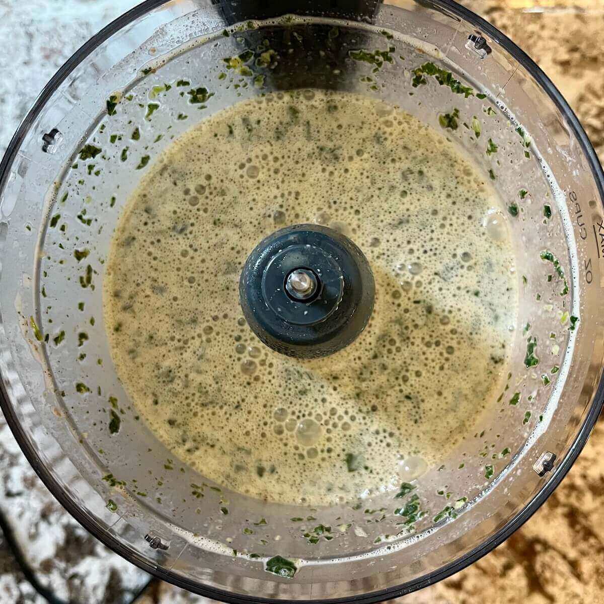 Wet ingredients for muffins blended in a food processor.