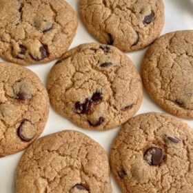Chocolate chip cookies made with coconut oil on a white plate